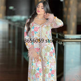 جلابية من الحرير مع الريش