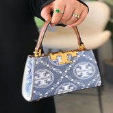 شنطة نسائية من ماركة توري بورش