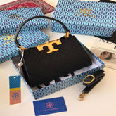 شنطة نسائية من ماركة توري بورش