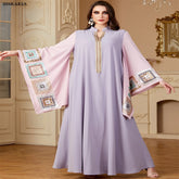 جلابية نسائية طويله مزينة بالترتر وأكمام واسعة أنيقة وفضفاضة