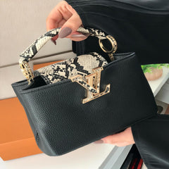 شنطة نسائية من ماركة لويس فيتون